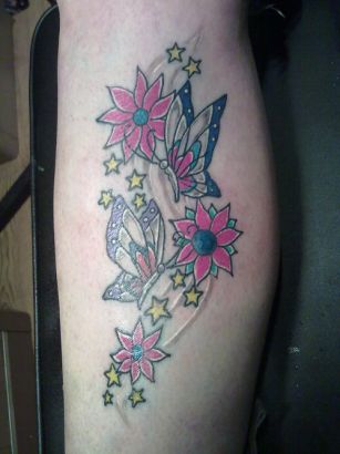 Flower With Butterfly Tat On Leg